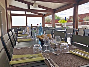 Breakfast, lunch, dinner served; international cuisine, pool views 