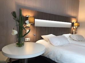 Premium bedding, pillow-top beds, minibar, in-room safe