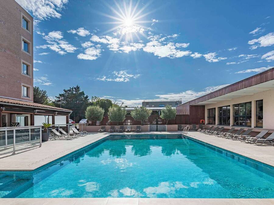 Outdoor pool, open 6:30 AM to 10:30 PM, sun loungers