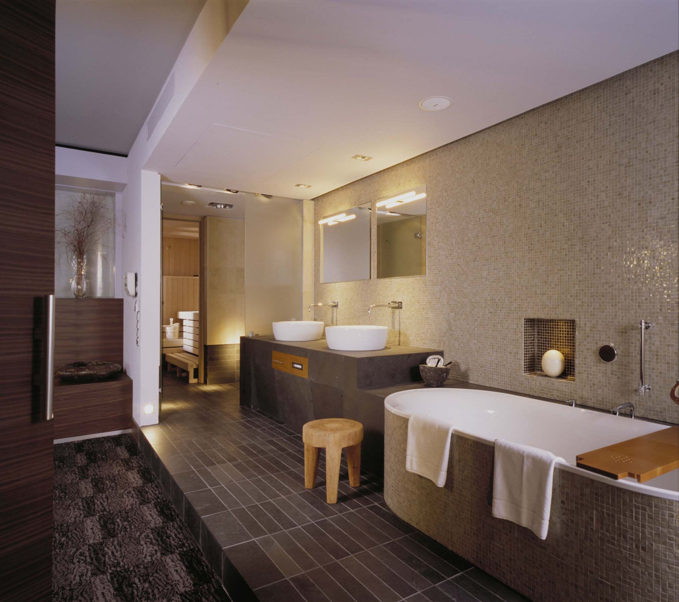 combined shower/bathtub, designer toiletries, hair dryer, bathrobes