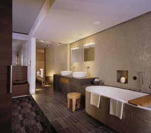 Combined shower/tub, designer toiletries, hair dryer, bathrobes