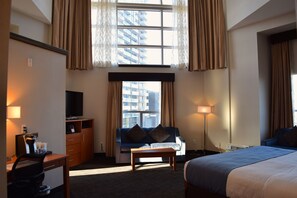 Suite, 1 King Bed, Non Smoking, Microwave | Desk, blackout drapes, iron/ironing board, free WiFi