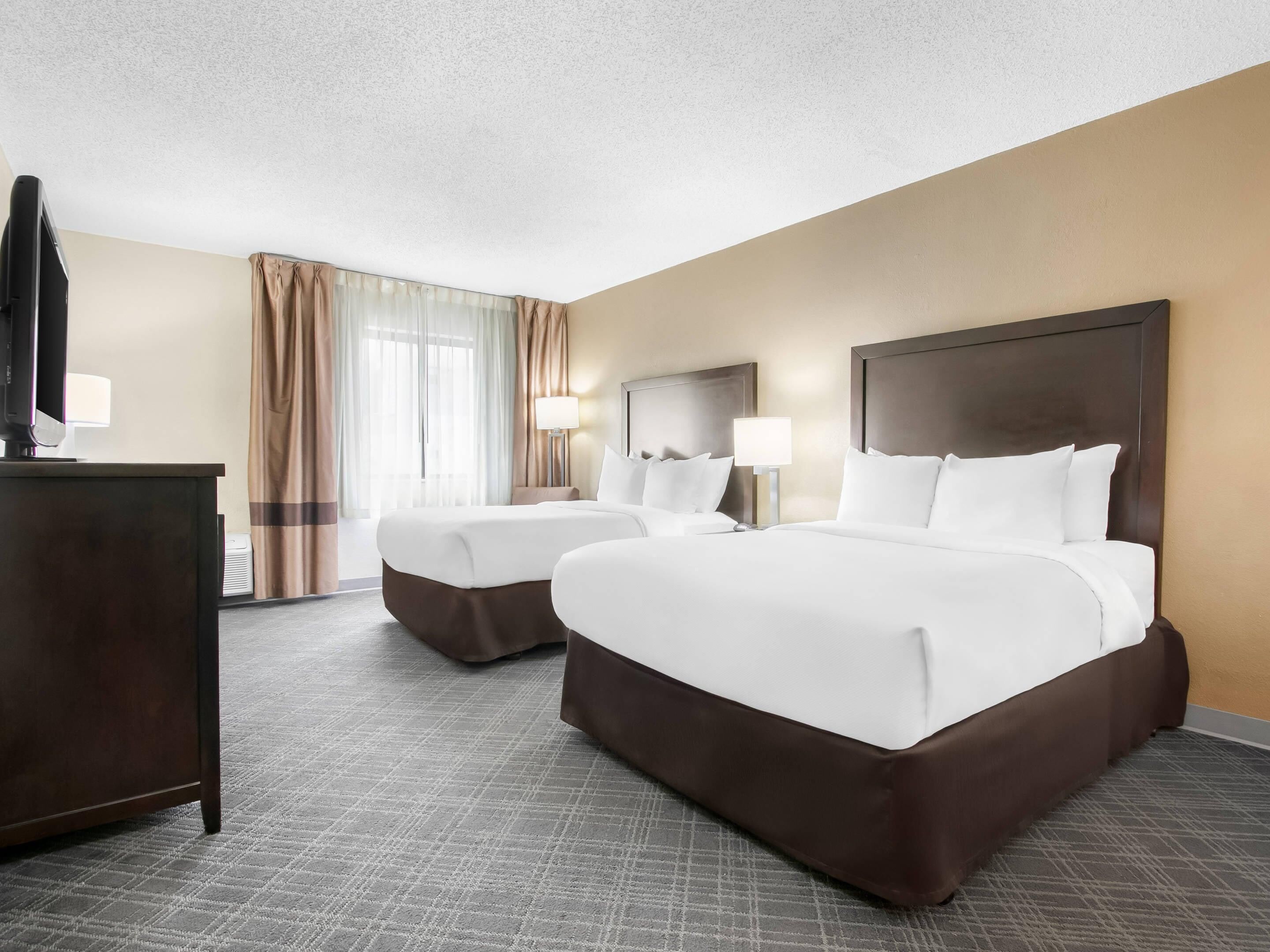Standard Room, 2 Double Beds, Non Smoking | Desk, laptop workspace, blackout curtains, iron/ironing board