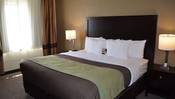 Desk, laptop workspace, blackout drapes, iron/ironing board