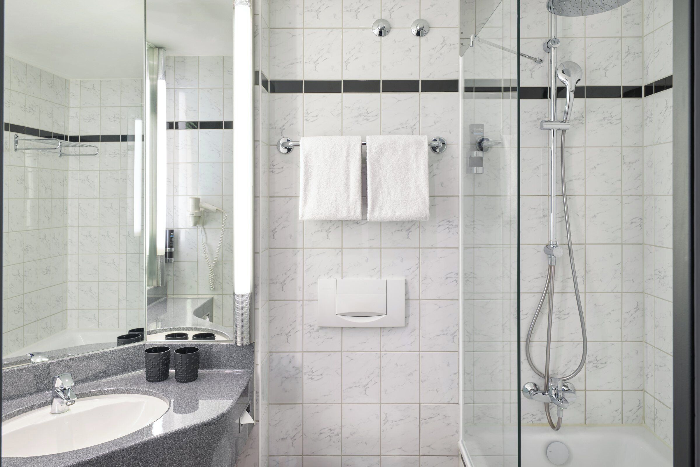 shower, free toiletries, hair dryer, towels