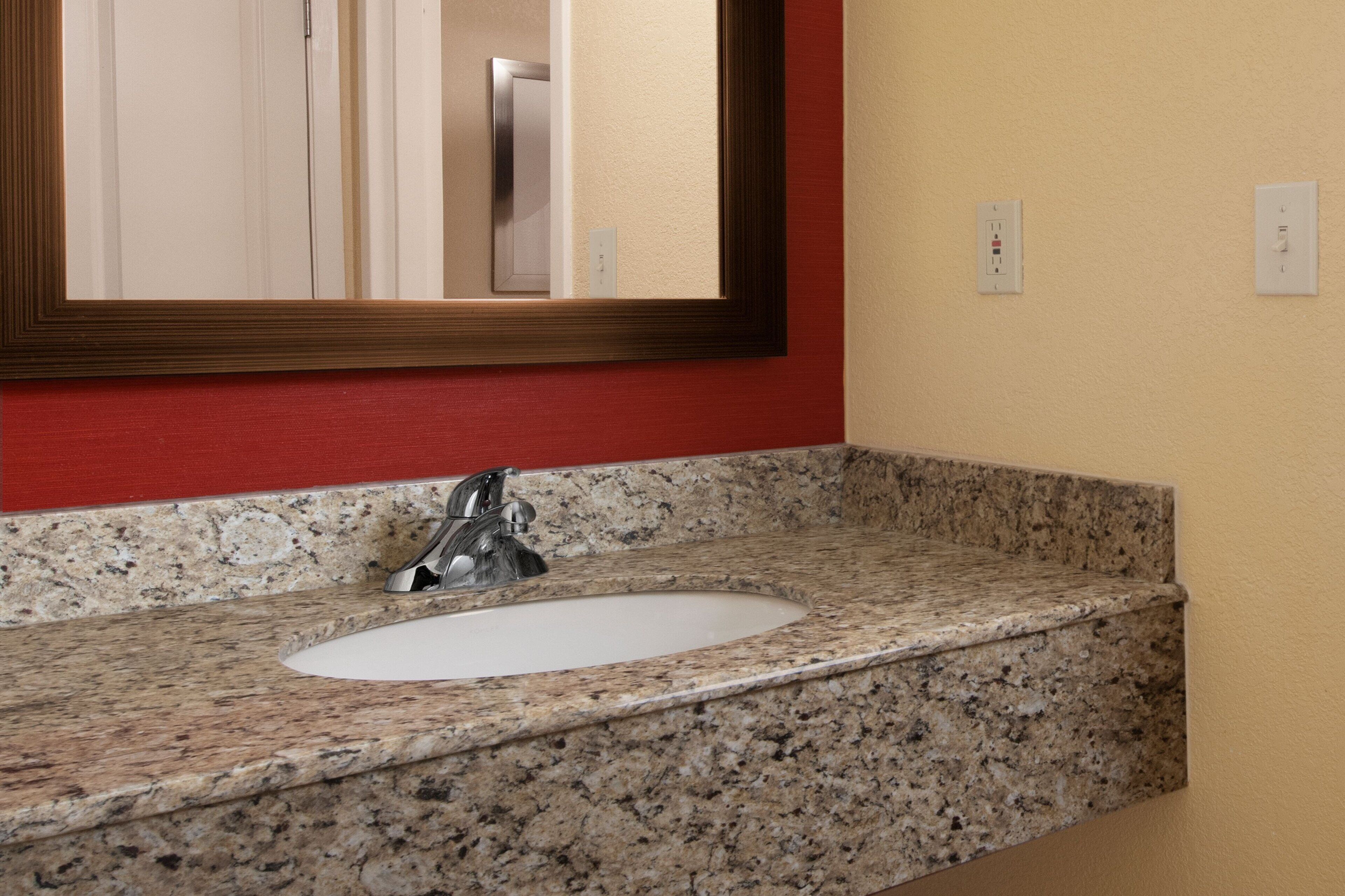 desk, laptop workspace, blackout curtains, iron/ironing board