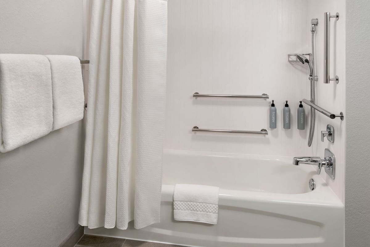 Room, 2 Double Beds (Mobility/Hearing Accessible, Tub) | Bathroom | Combined shower/tub, free toiletries, hair dryer, towels