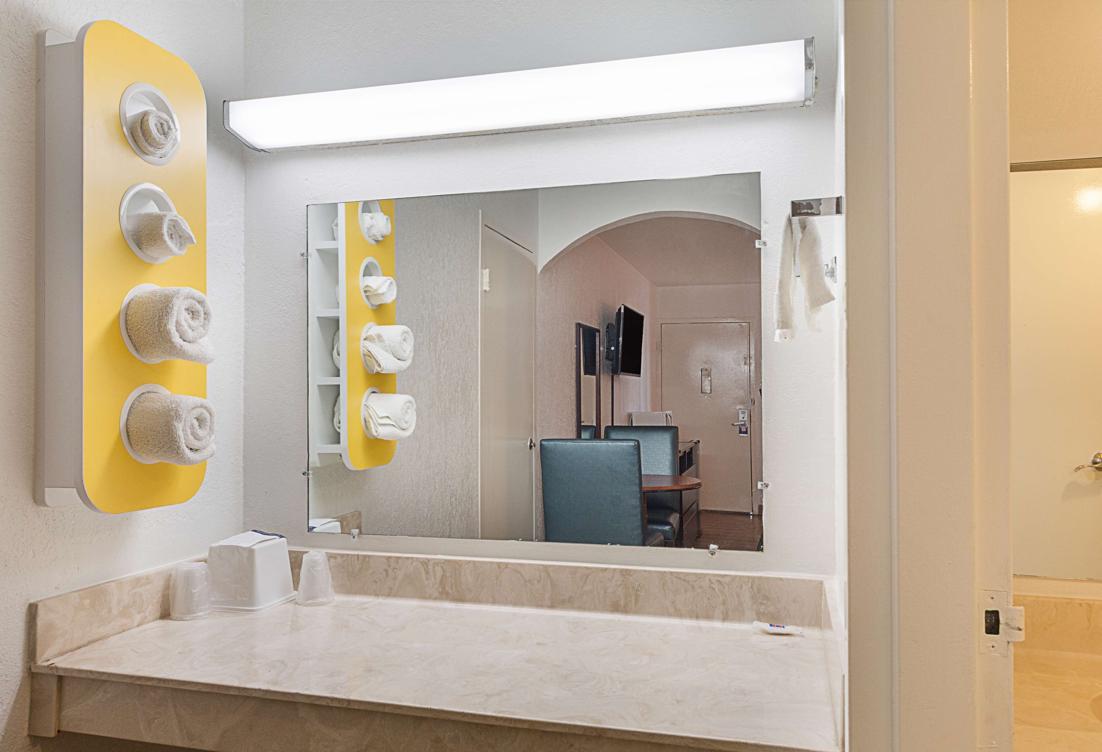 Combined shower/tub, towels, toilet paper