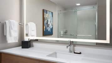 Designer toiletries, hair dryer, towels