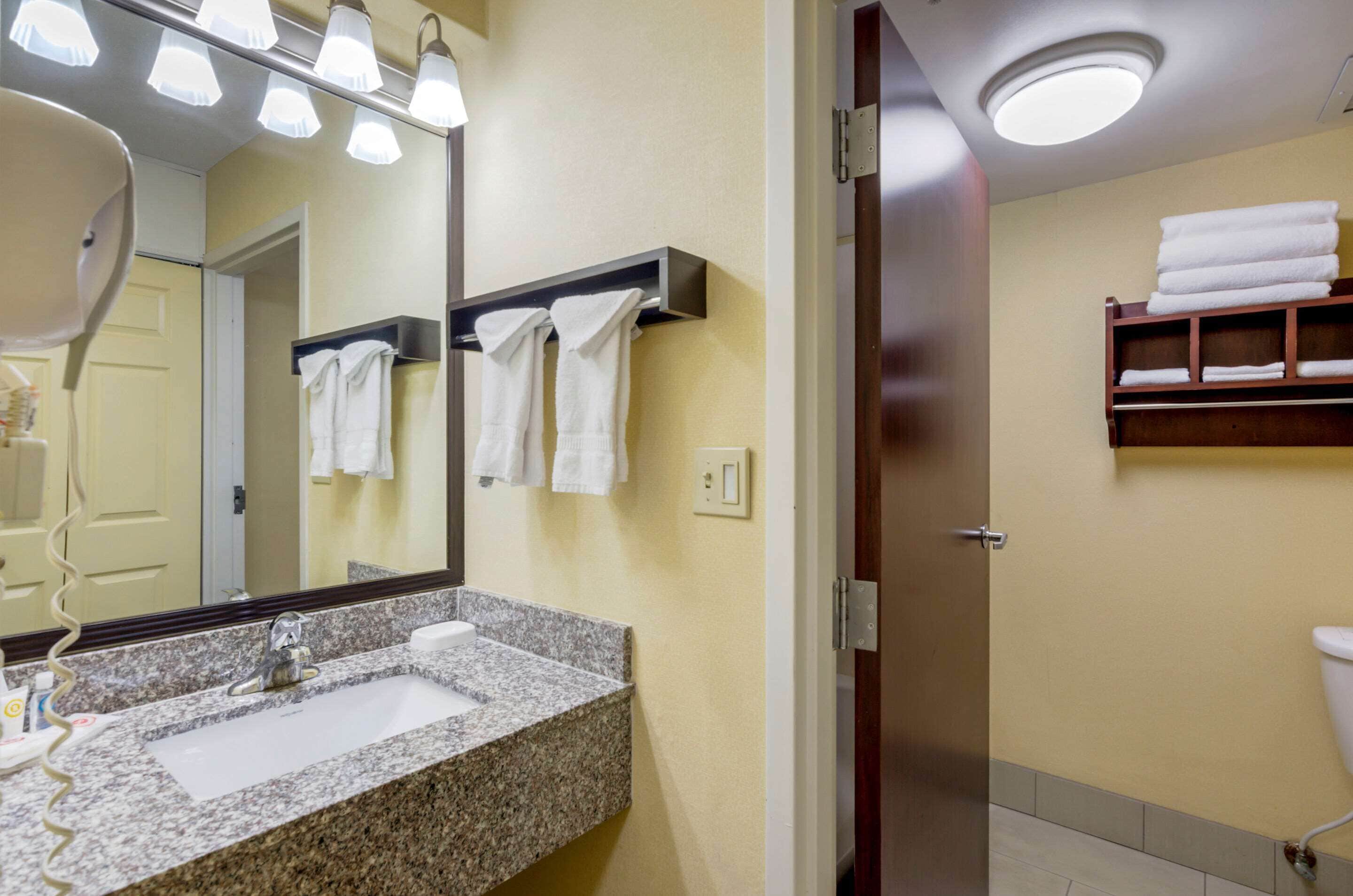 standard room, 2 queen beds, non smoking | bathroom | hair dryer, towels