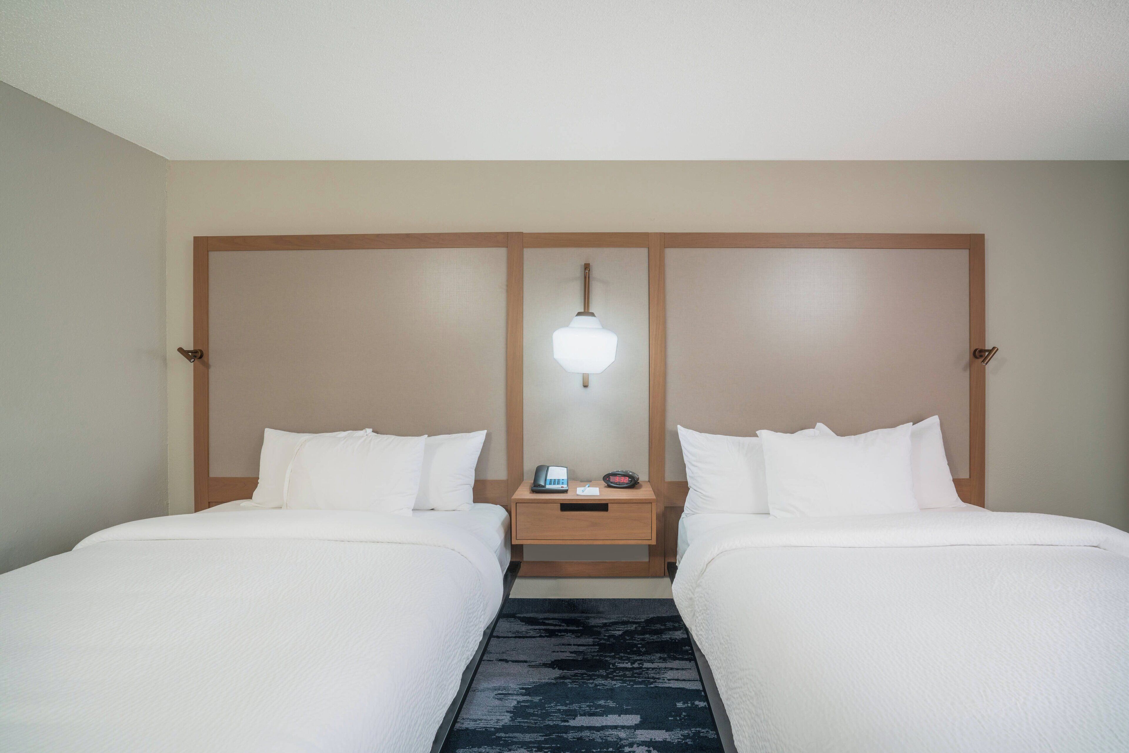 room, 2 queen beds | desk, iron/ironing board, free cots/infant beds, free rollaway beds