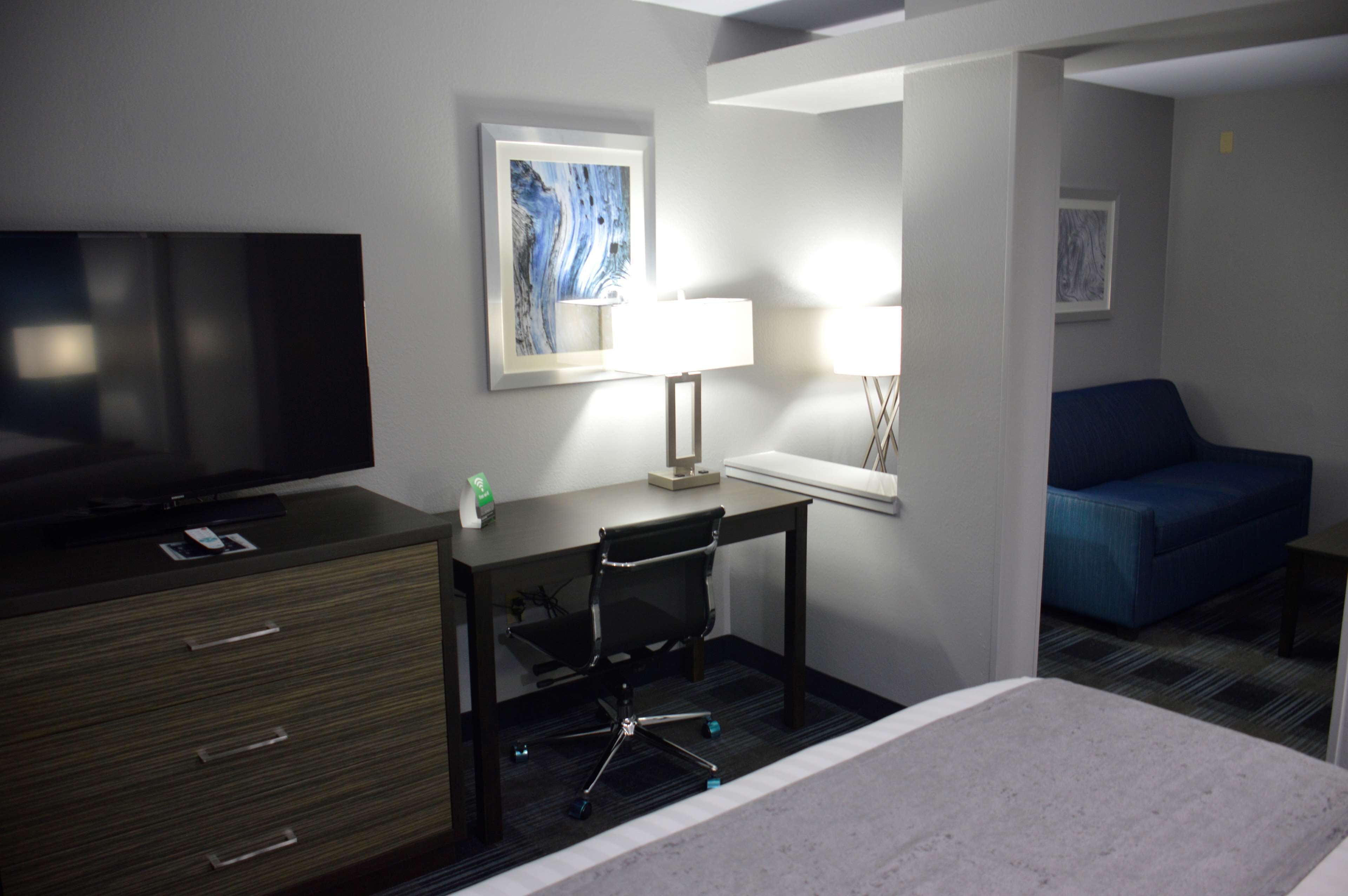 executive suite, 1 king bed, non smoking, refrigerator & microwave | desk, laptop workspace, blackout curtains, iron/ironing board