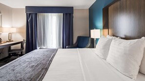 Desk, laptop workspace, blackout curtains, iron/ironing board