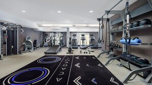 A modern gym with treadmills, weight machines, and a variety of fitness equipment. - Fairfield Inn by Marriott Philadelphia Airport (Philadelphia)
