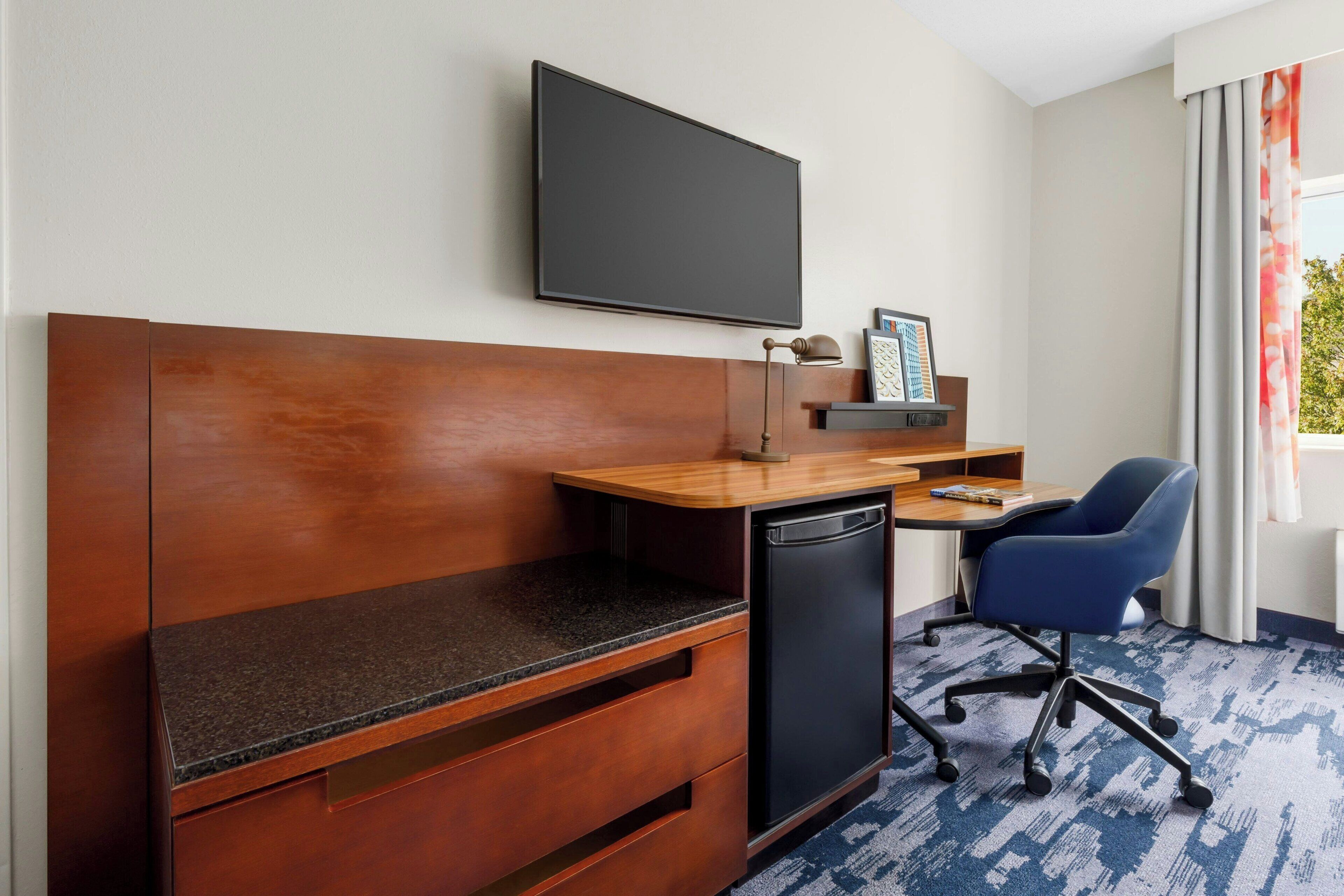 egyptian cotton sheets, down duvets, pillow-top beds, desk