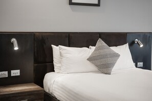 Standard Queen Room | Premium bedding, desk, blackout drapes, iron/ironing board