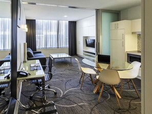 Premium bedding, desk, blackout drapes, iron/ironing board