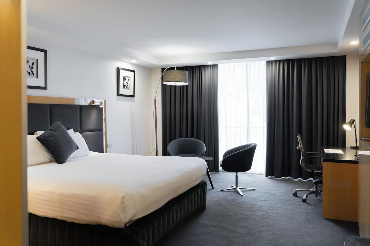 Superior King Room | Premium bedding, desk, blackout drapes, iron/ironing board