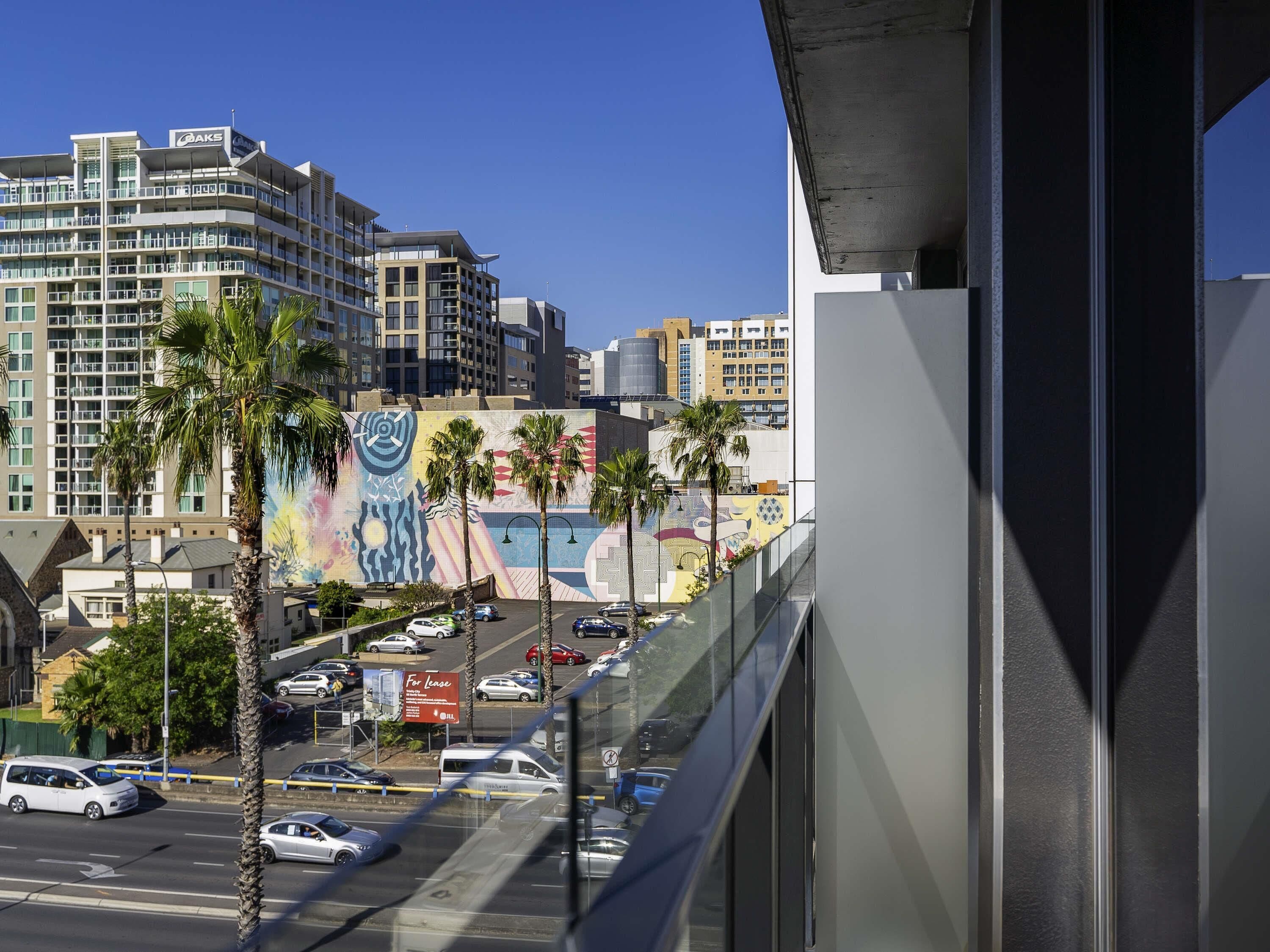 premium bedding, desk, blackout curtains, iron/ironing board