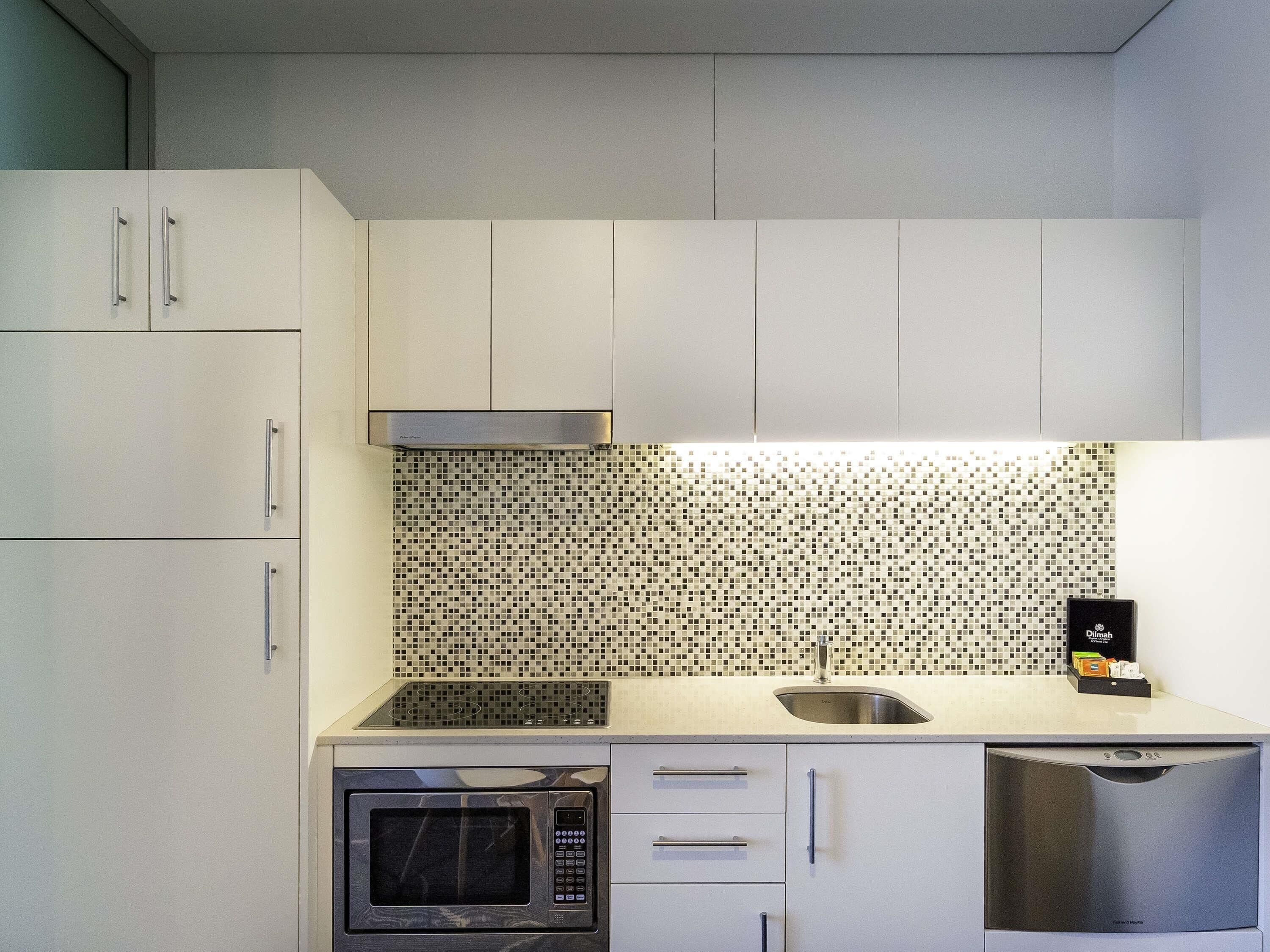 premium bedding, desk, blackout curtains, iron/ironing board