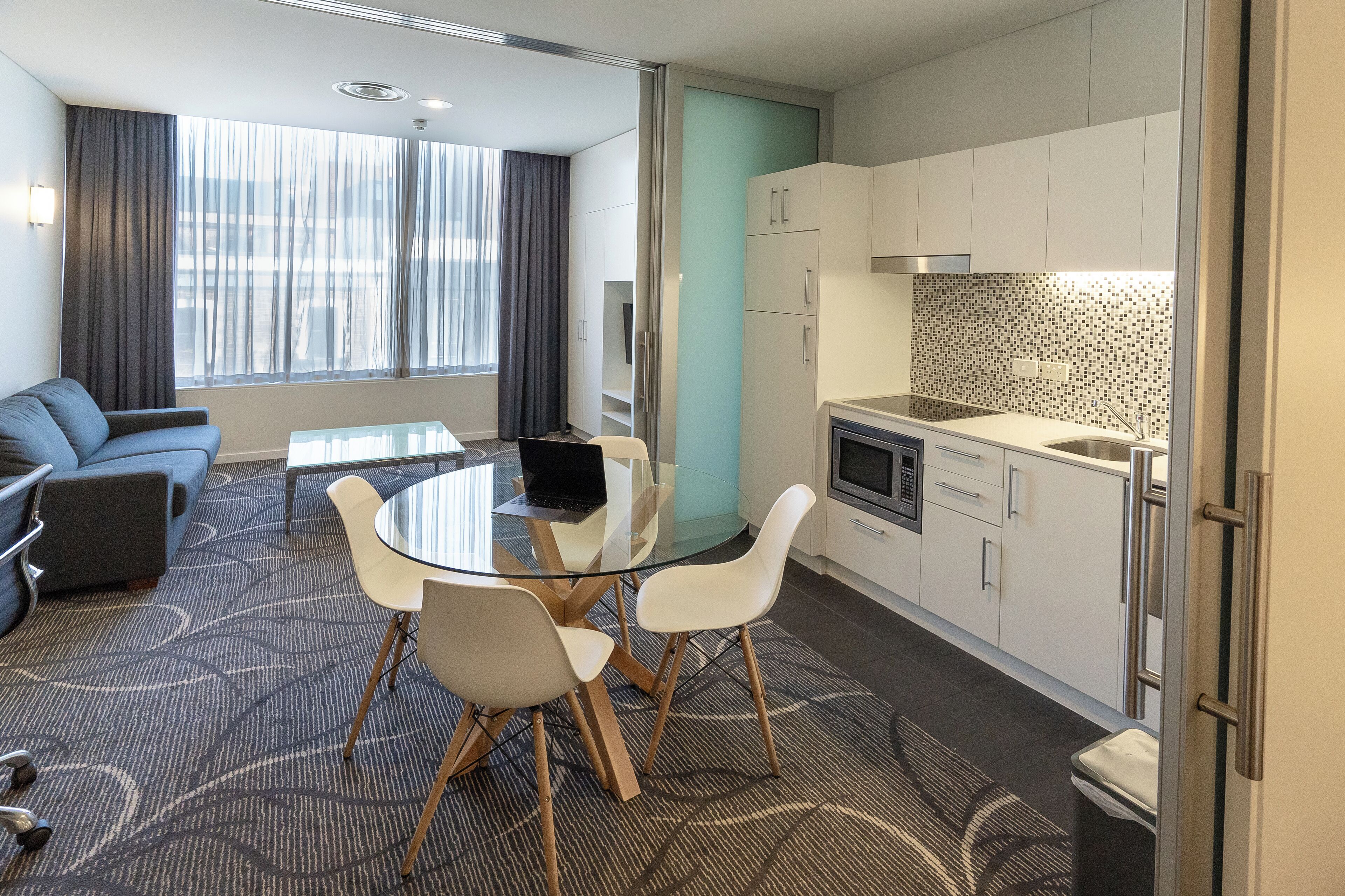 Deluxe King Suite | Premium bedding, desk, blackout drapes, iron/ironing board