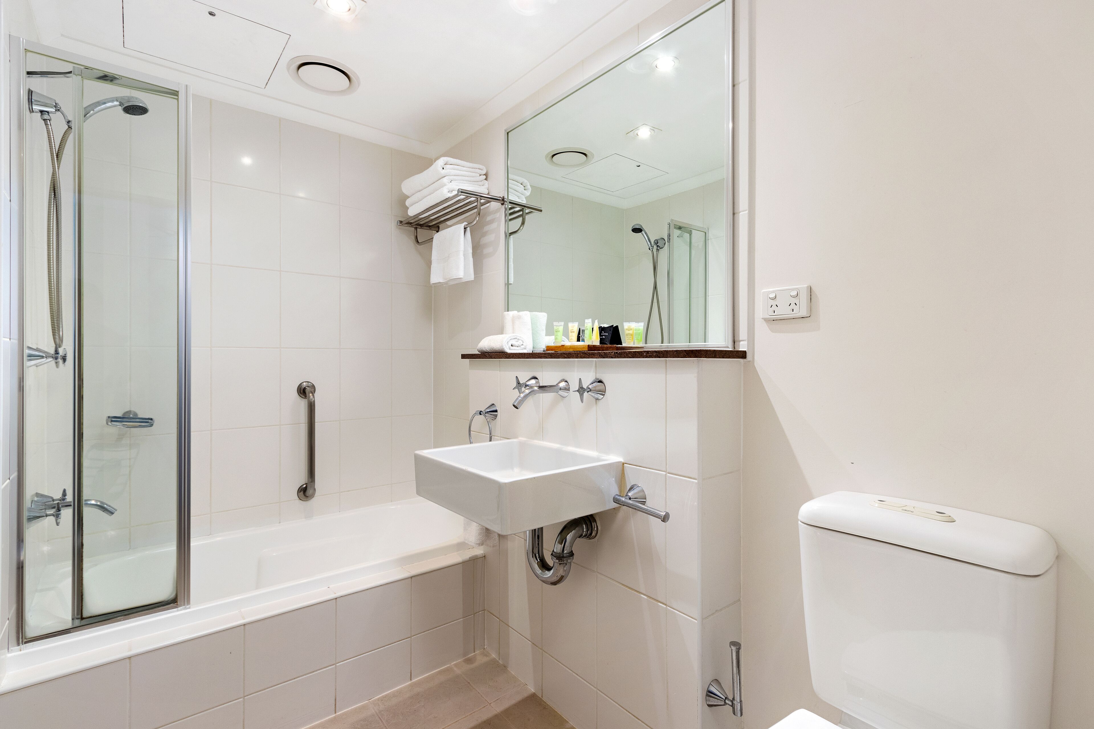 eco-friendly toiletries, hair dryer, towels, soap