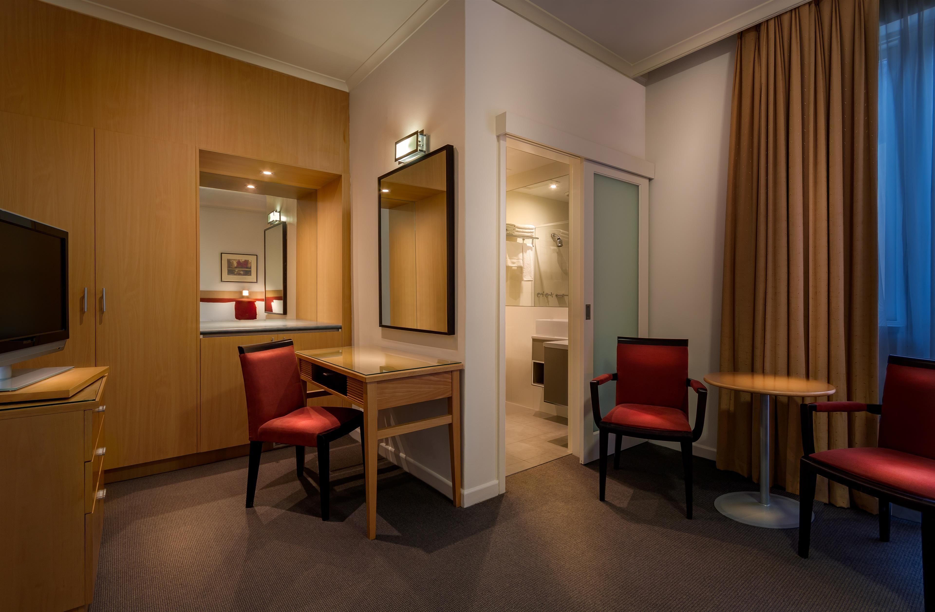 deluxe room, multiple beds, non smoking (walk-in shower) | premium bedding, in-room safe, desk, laptop workspace