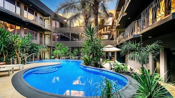 Outdoor pool, pool umbrellas, pool loungers