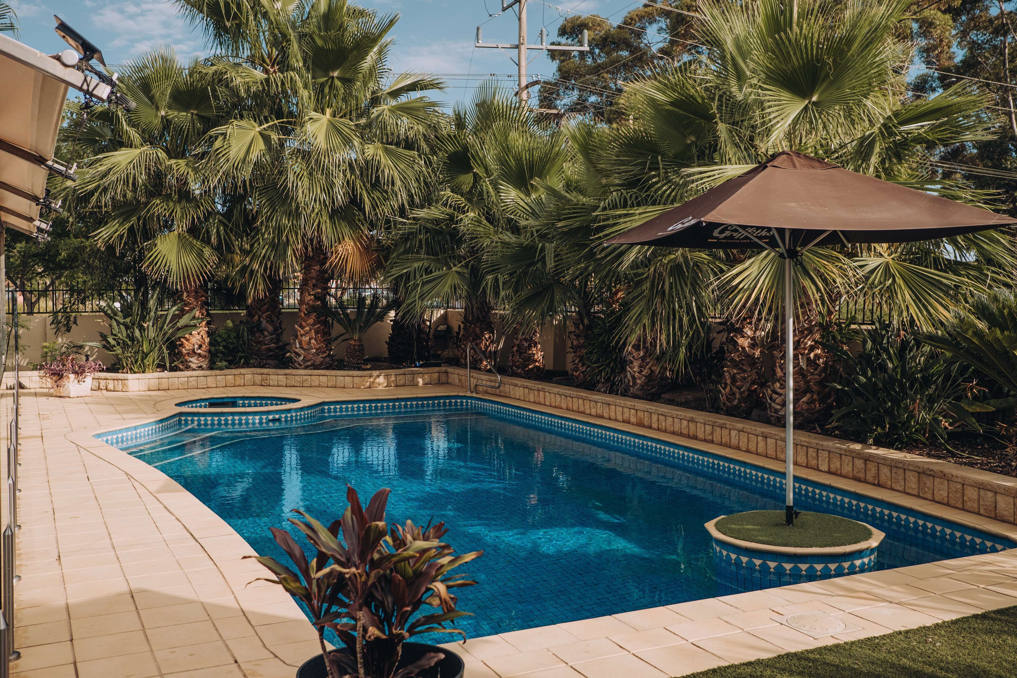 Outdoor pool, pool umbrellas, pool loungers