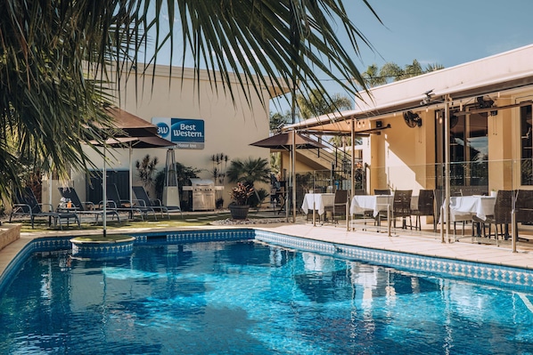 Outdoor pool, pool umbrellas, pool loungers