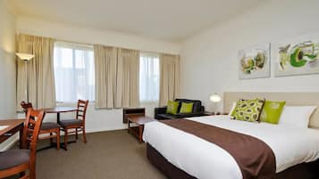 Select Comfort beds, desk, blackout curtains, iron/ironing board