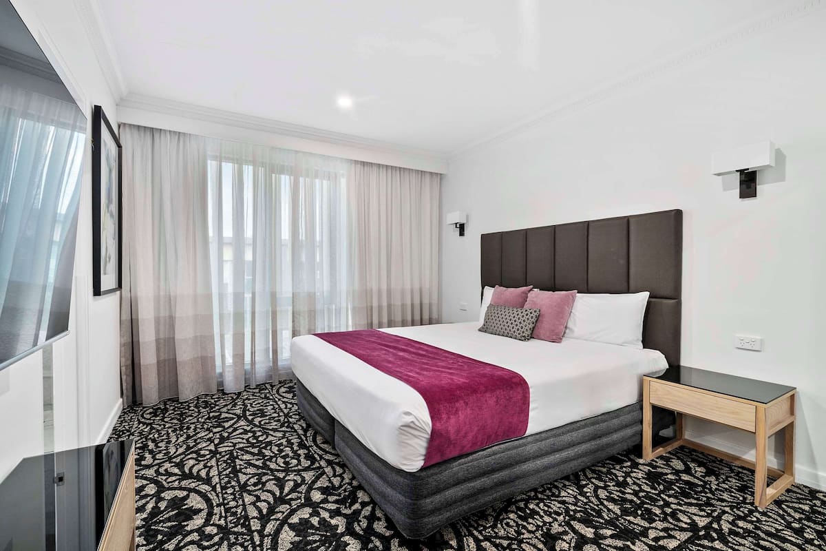 Grand Suite | Premium bedding, desk, blackout drapes, iron/ironing board