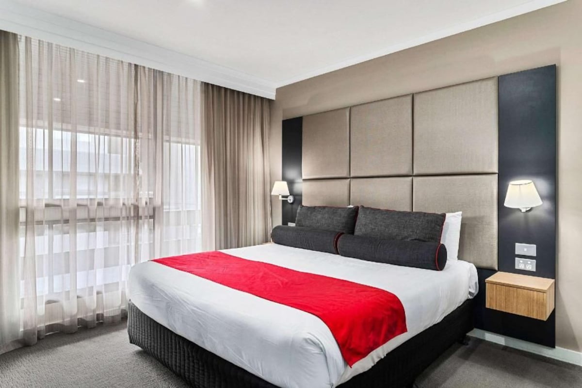 Premium bedding, desk, blackout drapes, iron/ironing board