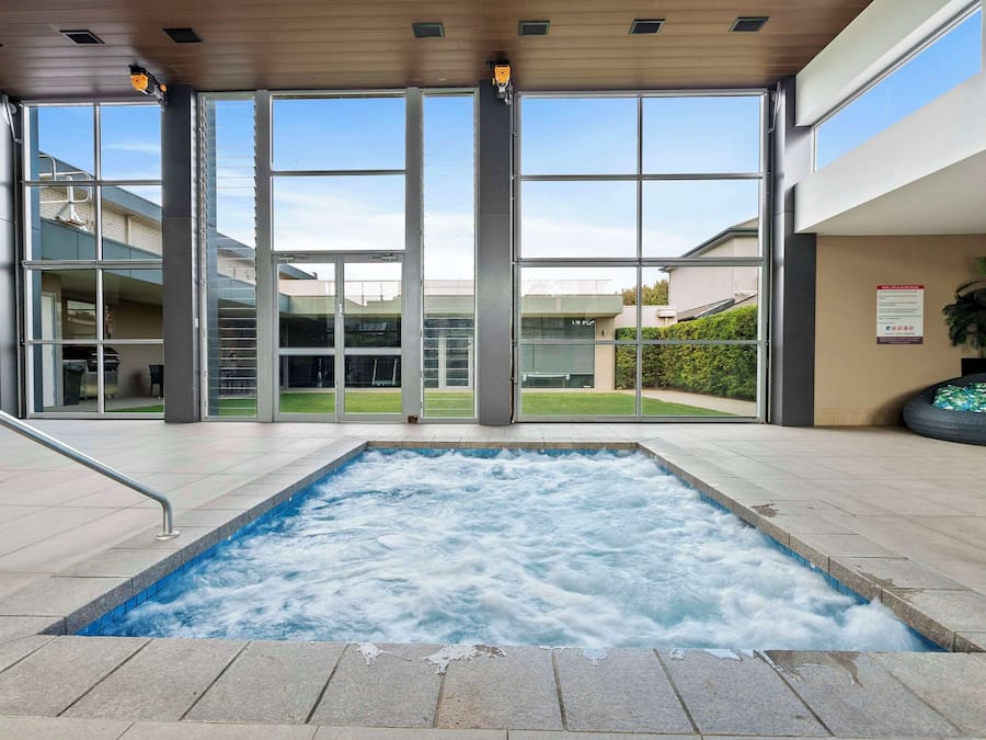 Indoor pool, open 7:00 AM to 9:30 PM, pool loungers