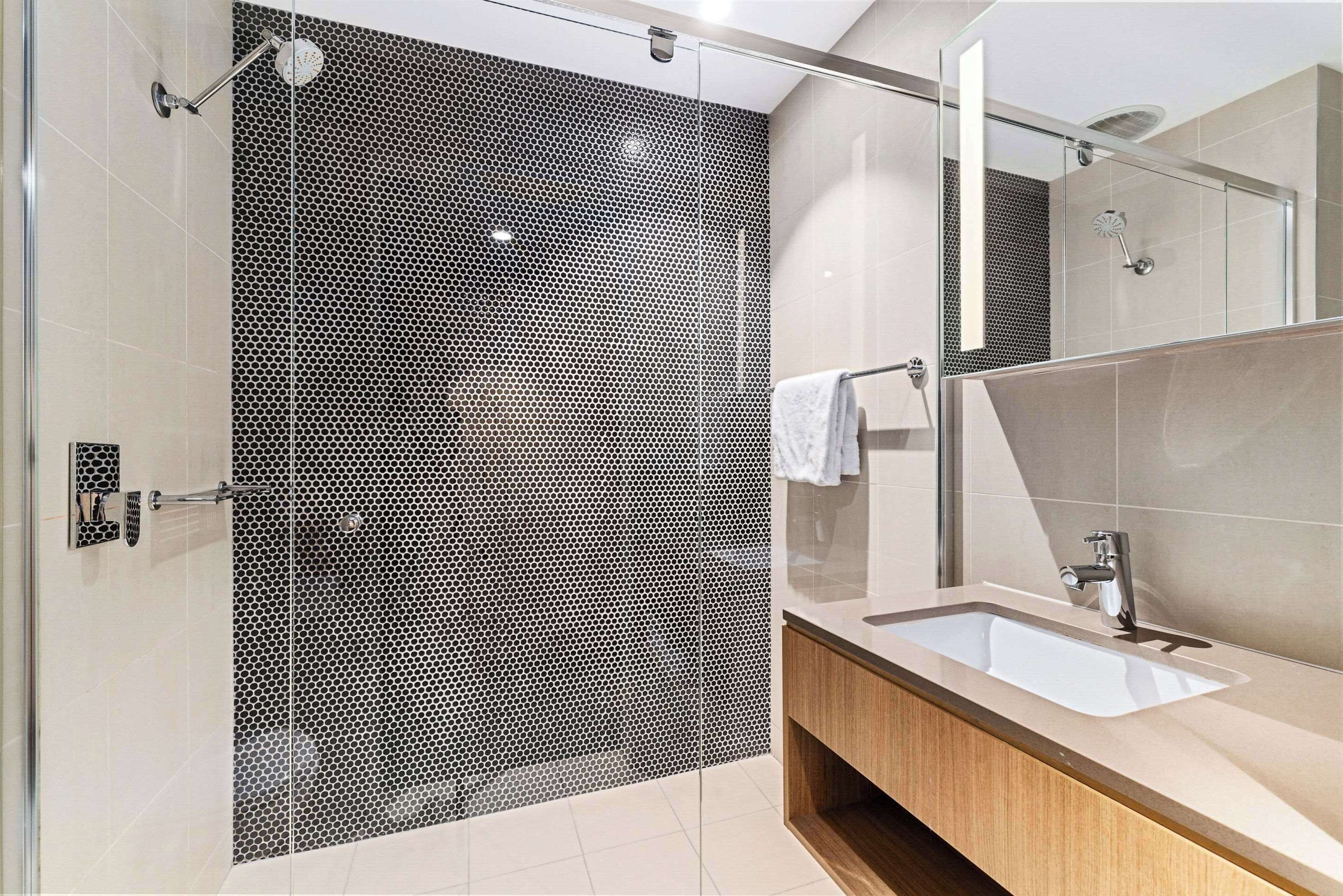 deluxe queen room | premium bedding, desk, blackout curtains, iron/ironing board