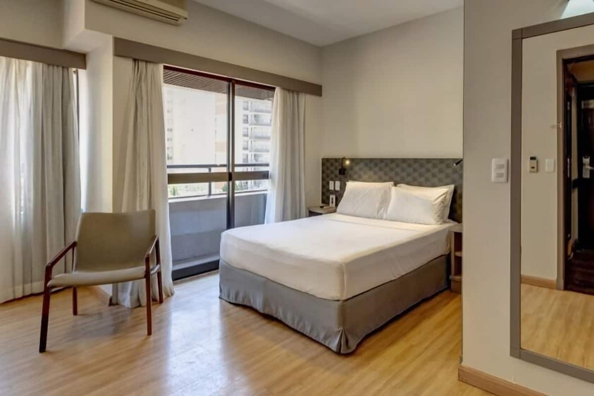 Superior Double Room | Minibar, in-room safe, desk, laptop workspace