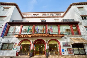 A hotel with a prominent sign reading "HOTEL GUADALUPE HOTEL".