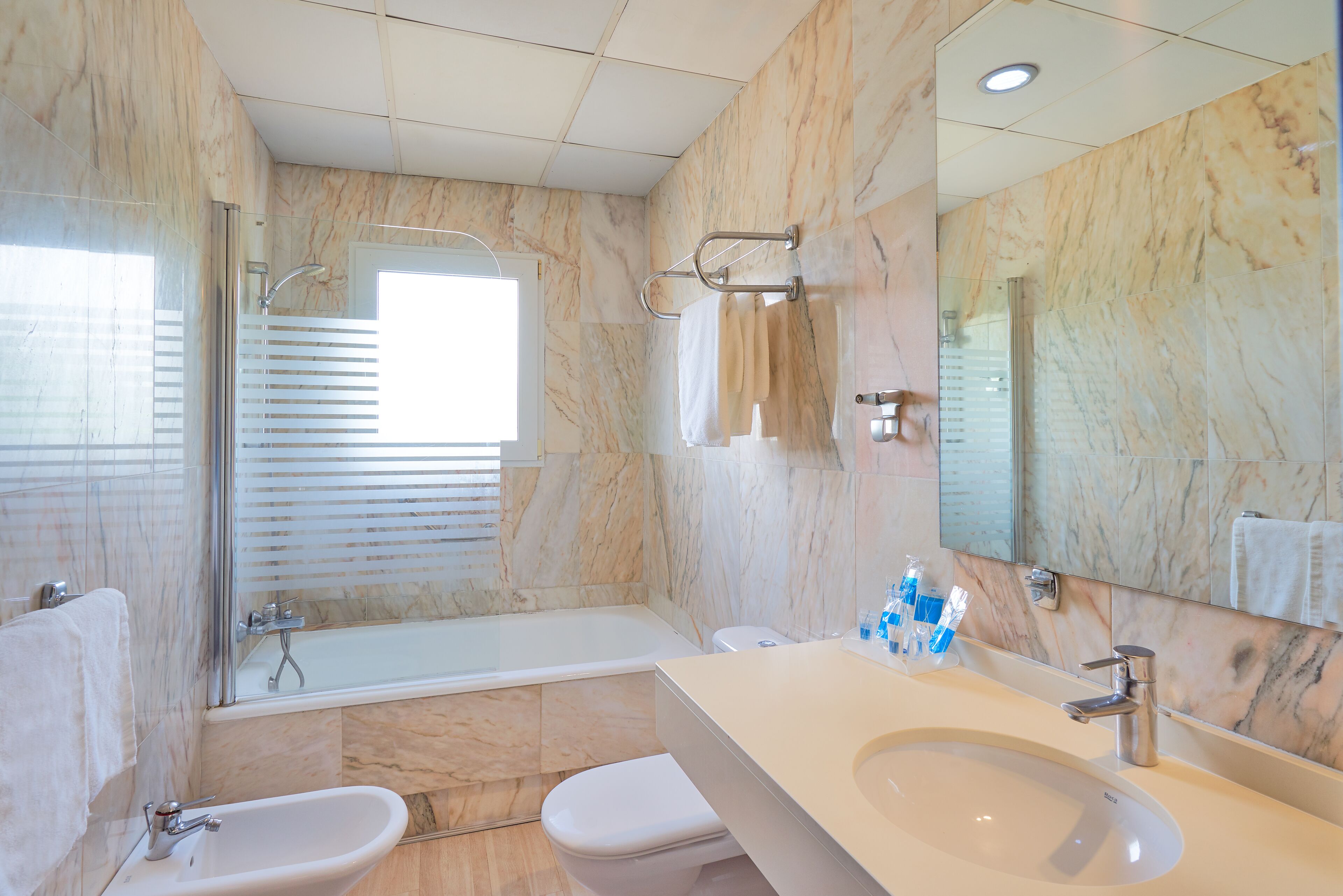 combined shower/bathtub, deep-soaking bathtub, eco-friendly toiletries