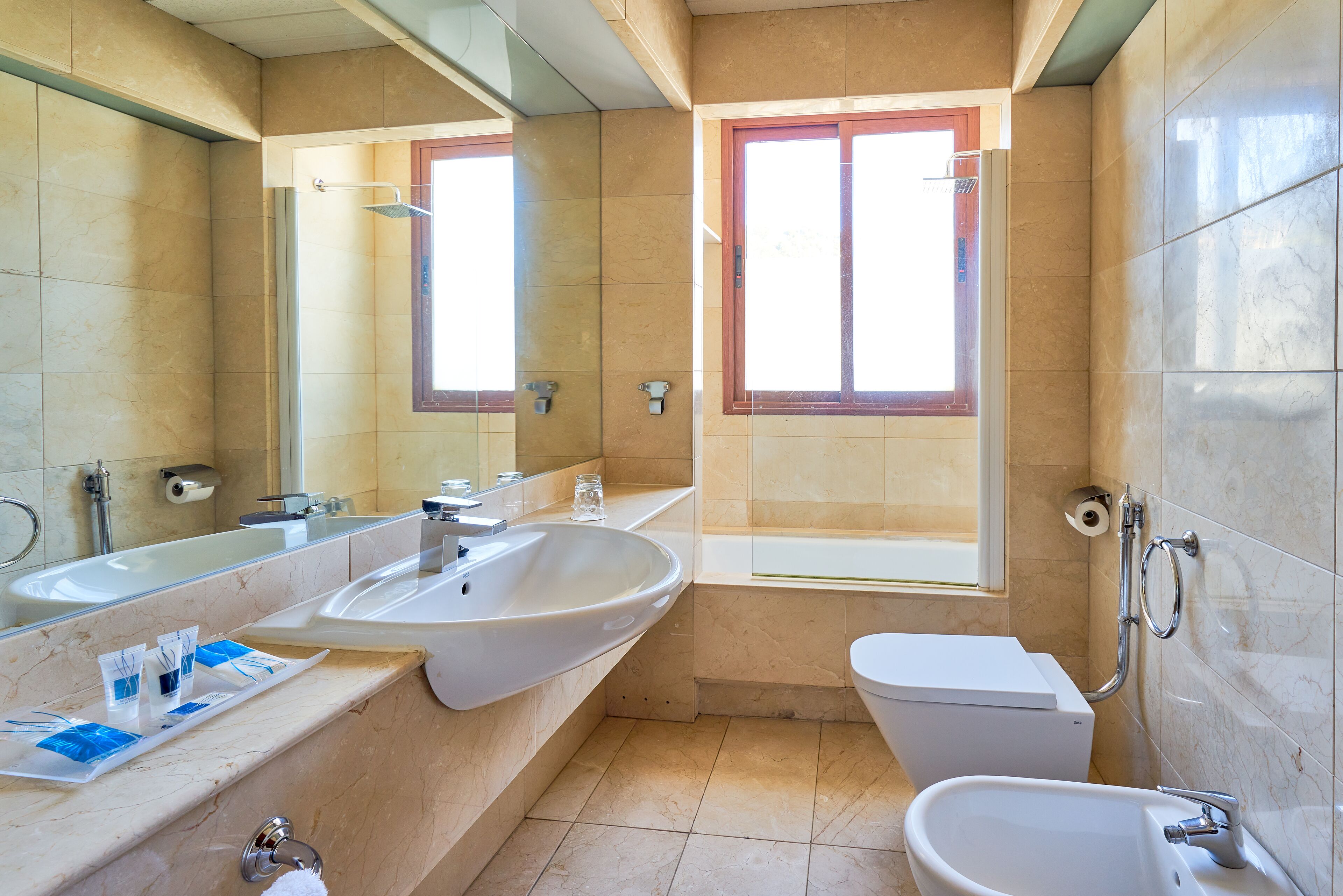 combined shower/bathtub, deep-soaking bathtub, eco-friendly toiletries