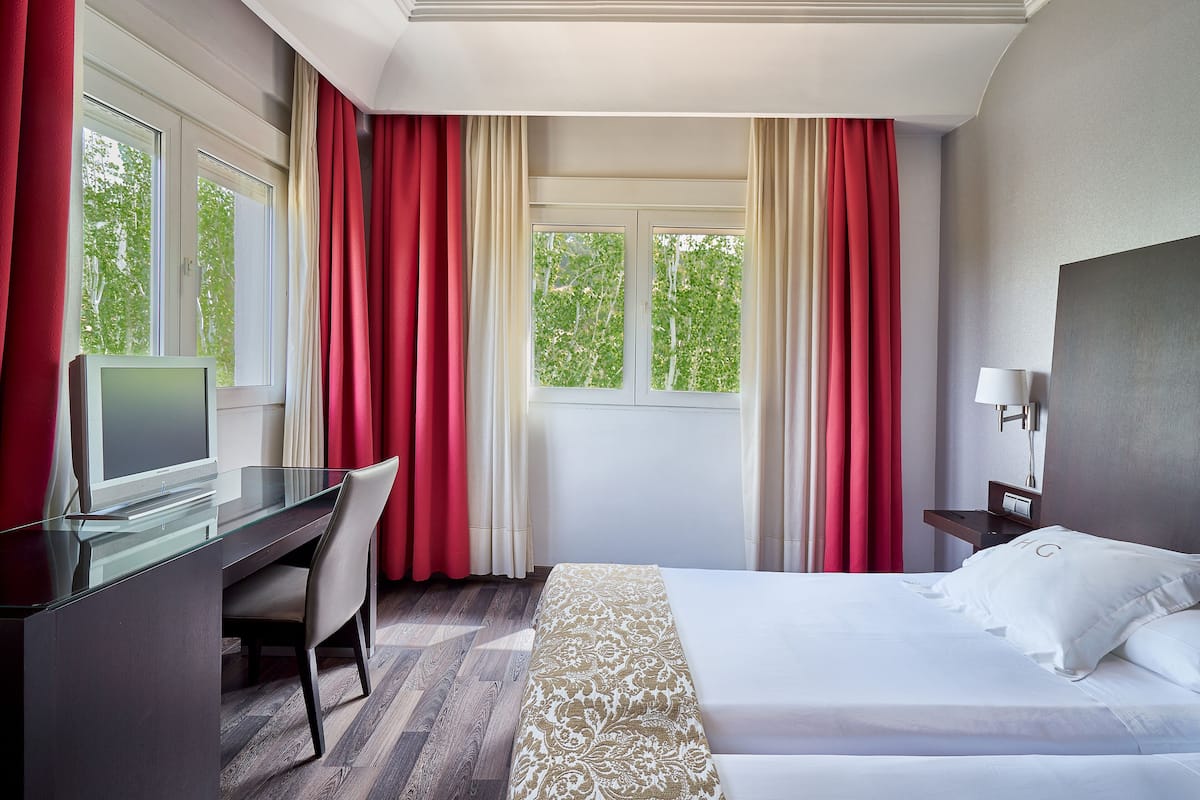 1 habitación, ropa de cama hipoalergénica, cubrecamas y minibar
