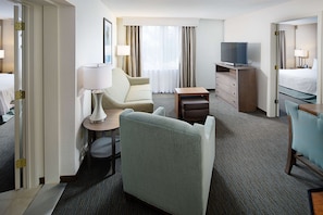 Premium bedding, desk, laptop workspace, blackout curtains