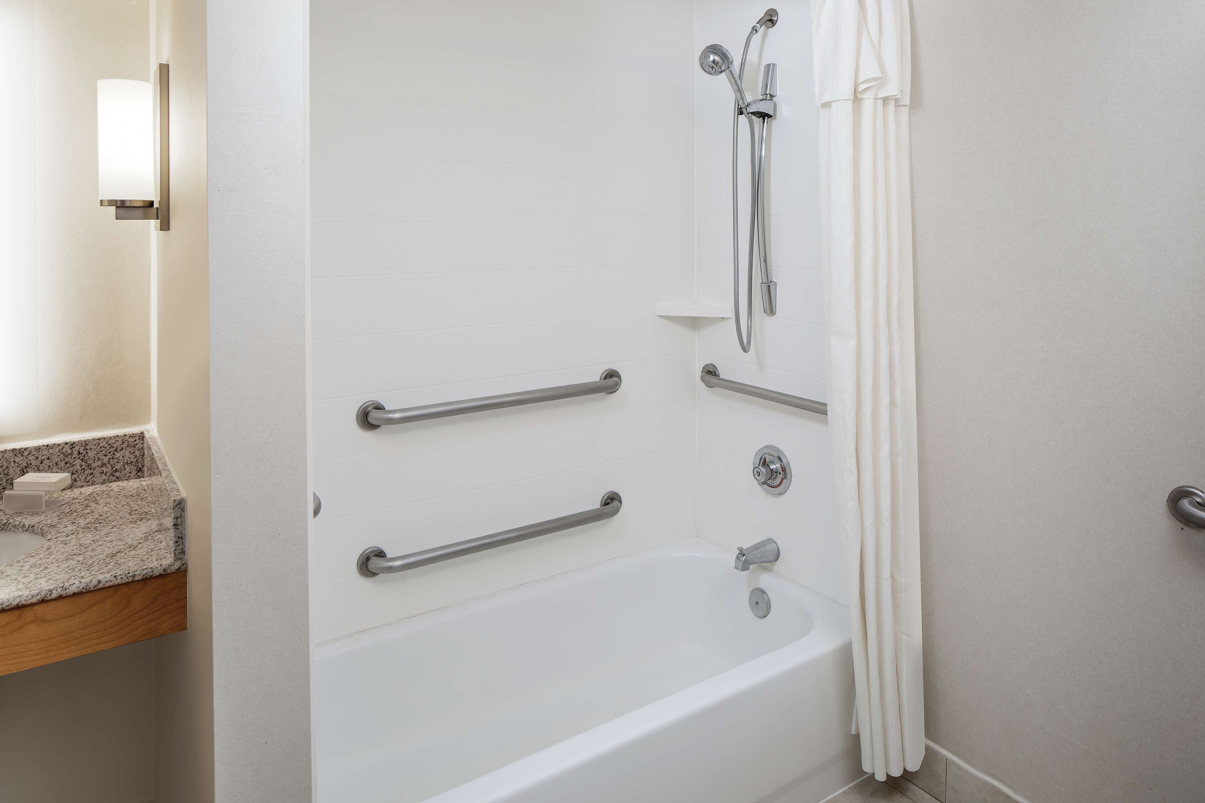 combined shower/bathtub, free toiletries, hair dryer, bathrobes