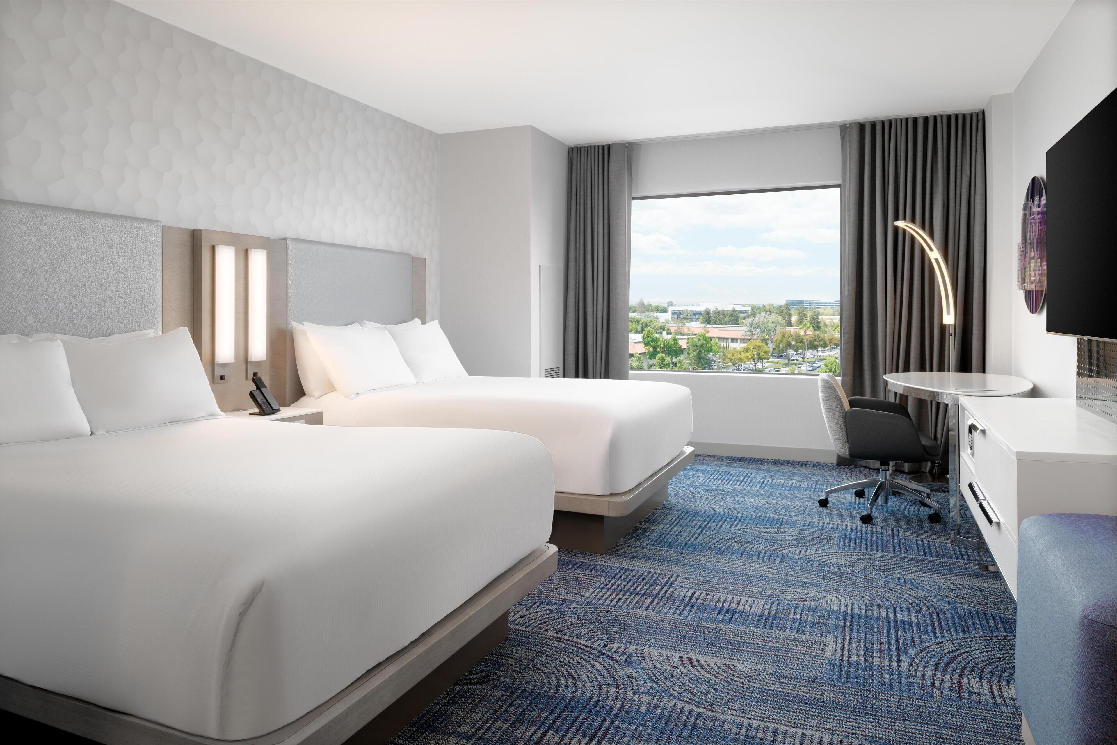 Premium bedding, pillow-top beds, in-room safe, desk