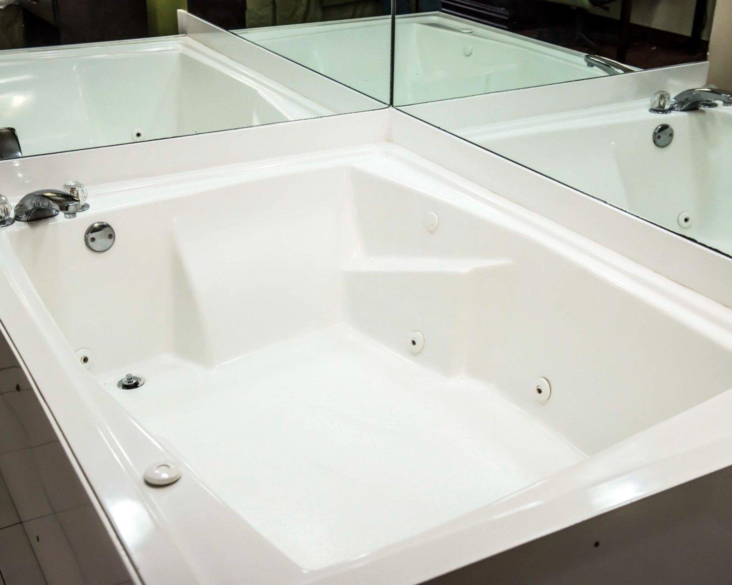 bathtub, free toiletries, hair dryer, towels