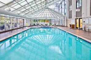 Indoor pool, open 9 AM to 10 PM, pool umbrellas, pool loungers