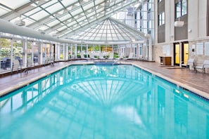 Indoor pool, open 9 AM to 10 PM, pool umbrellas, sun loungers