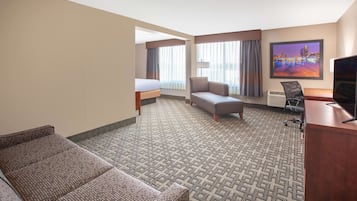 Pillowtop beds, desk, blackout drapes, iron/ironing board