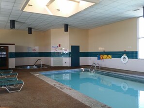 Indoor pool, open 9:00 AM to 11:00 PM, pool loungers