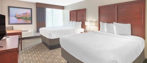 Pillowtop beds, desk, blackout drapes, iron/ironing board