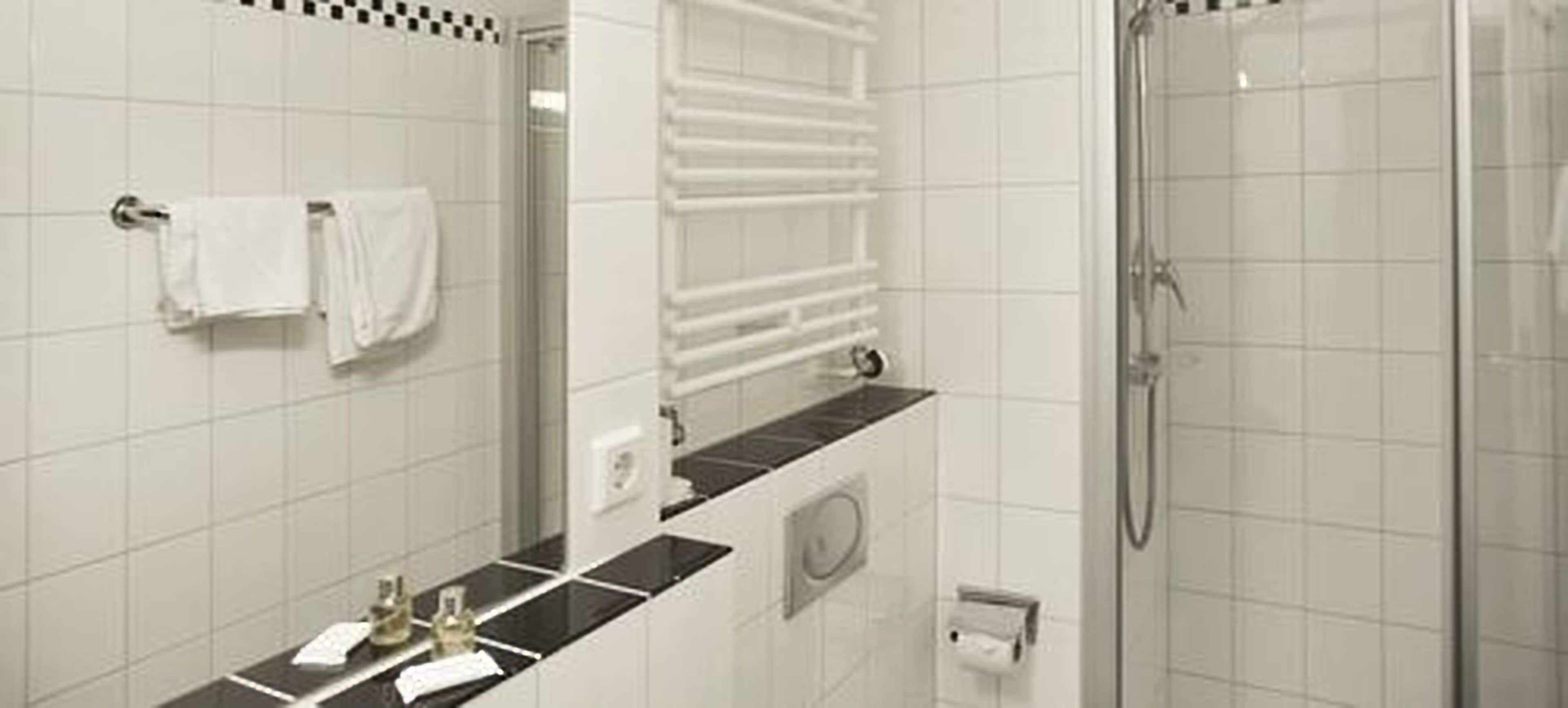 shower, eco-friendly toiletries, hair dryer, towels